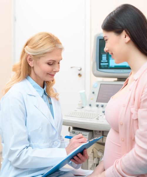 obstetrician-gynecologist-consulting-happy-young-pregnant-woman-and-writing-in-clipboard.jpg obstetrician-gynecologist-consulting-happy-young-pregnant-woman-and-writing-in-clipboard.jpg